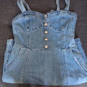 Women’s denim dress. Button up with pockets.
